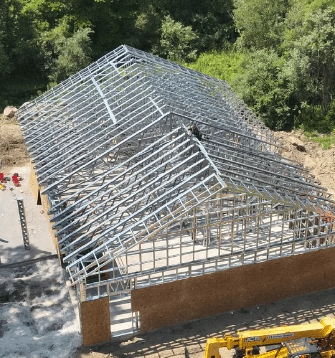 Aerial view of steel frame barndominium construction in Colorado